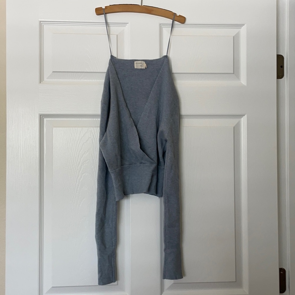 Crop top open chested, long sleeve.